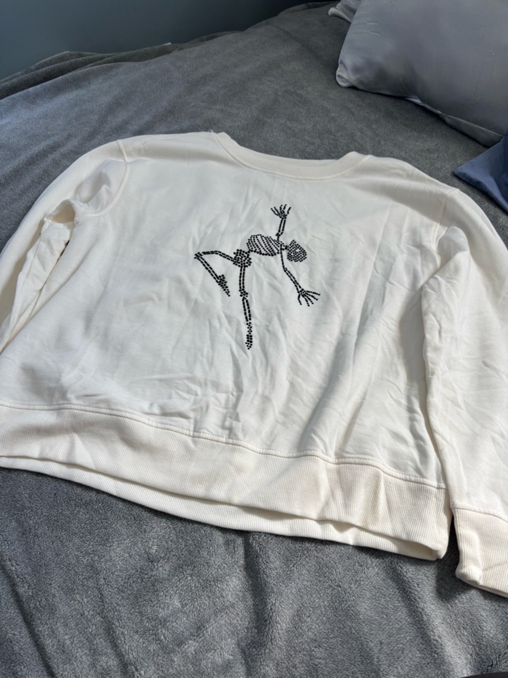 Jane and Delancey Cream Crewneck Sweatshirt with Black Skeleton Embroidery